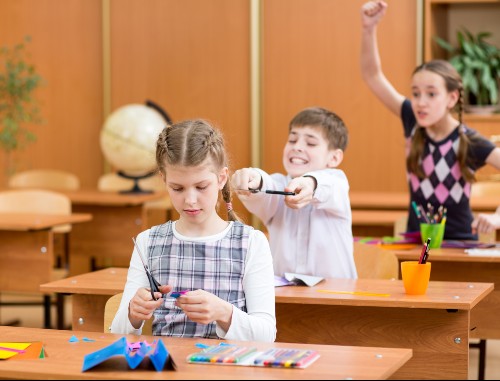 Argumentative adolescent arguing with her peers