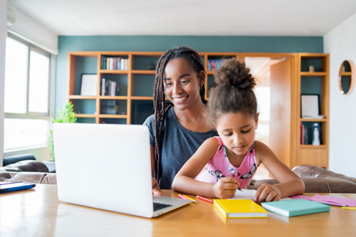 young mum receiving behaviour coaching online with her daughter present