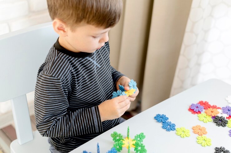 child playing with connection toy