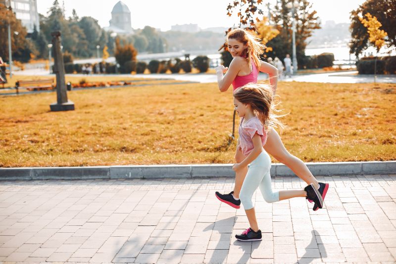 Mother and daughter using exercise as a form of emotional regulation