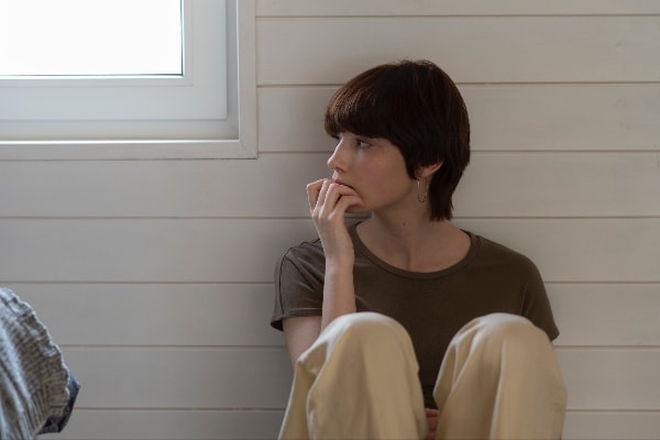 young woman showing signs of anxiety