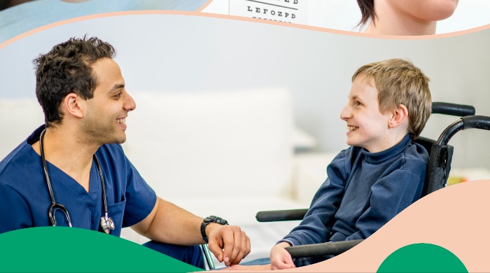 Doctor and child in a medical setting looking cheerful